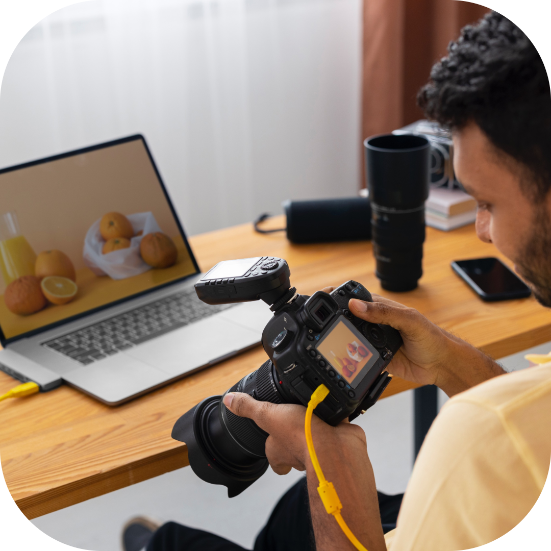 a man keeping track of his photos while taking them