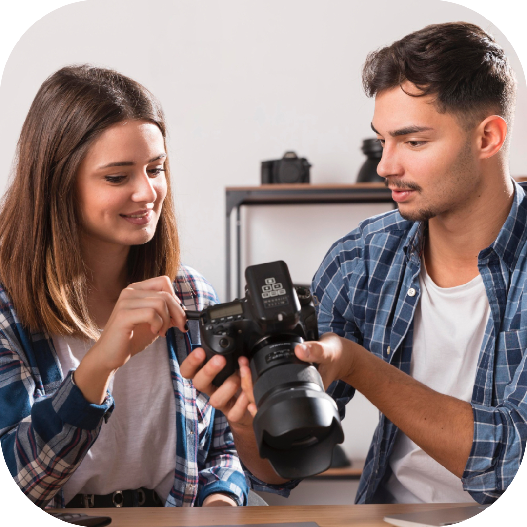 a photographer working with his client whiles on set