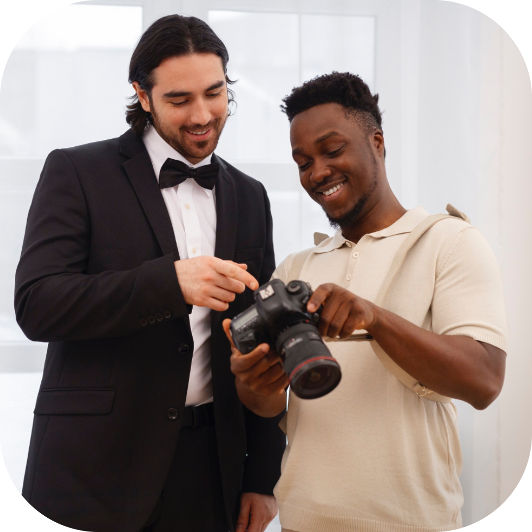 a wedding photographer connecting with his client about the special moments being captured