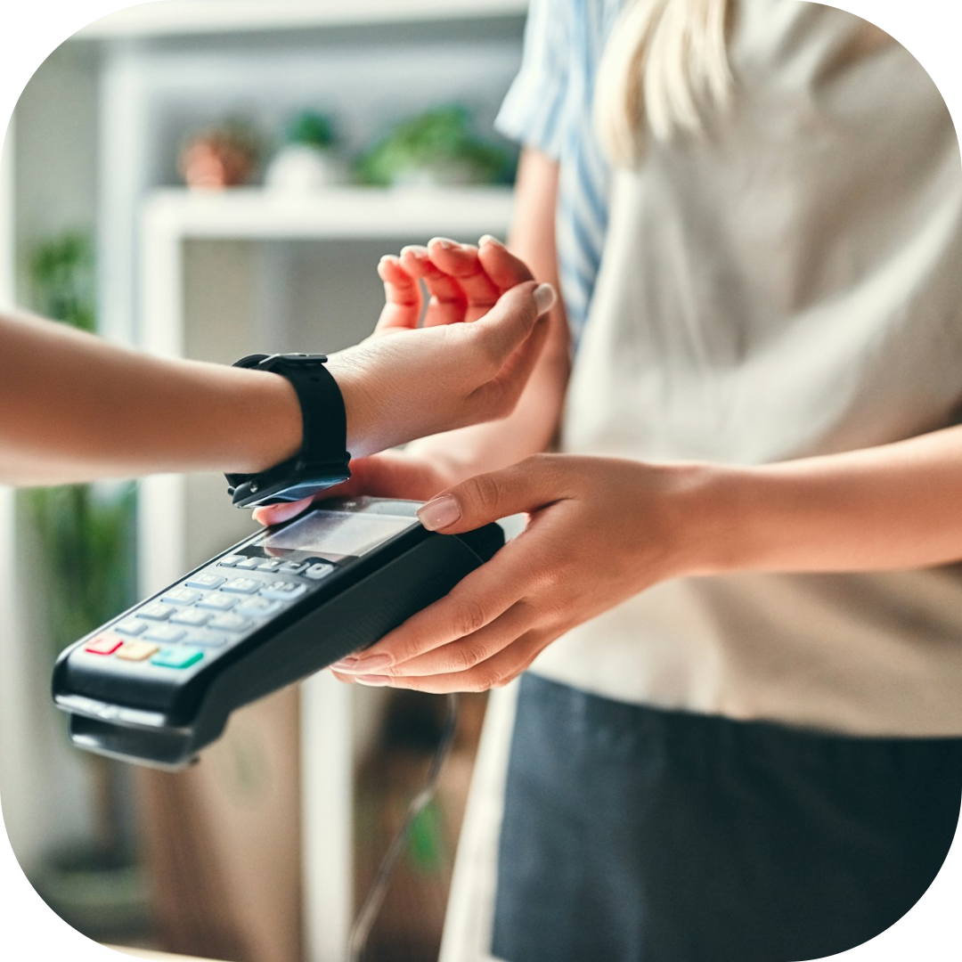 customer paying with smart watch