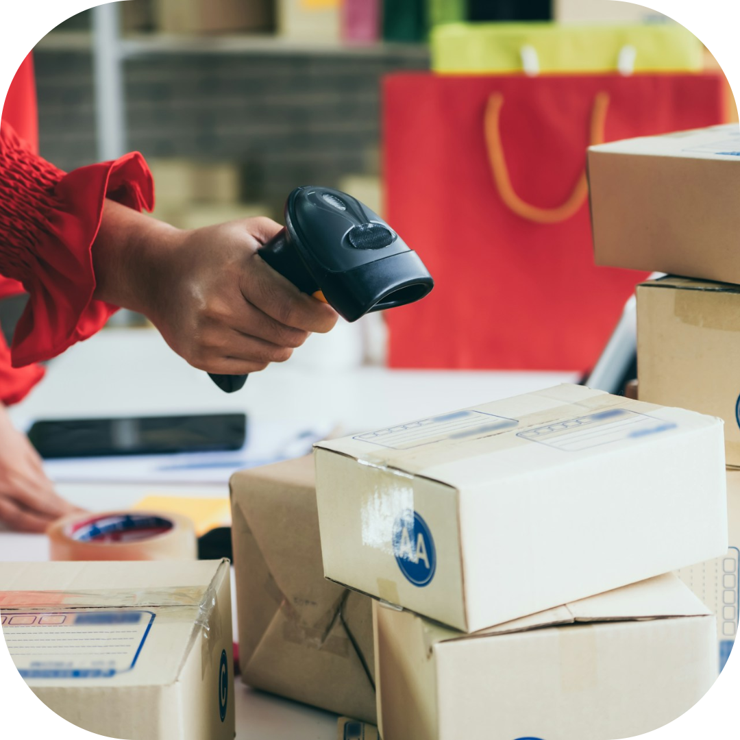 employee scanning packings for shipping