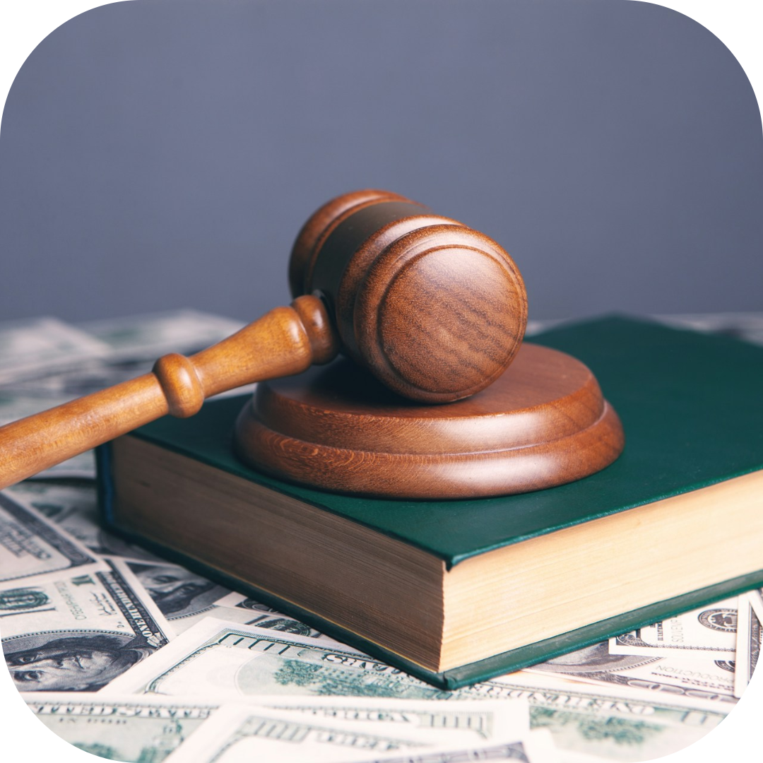 gavel and money on law book