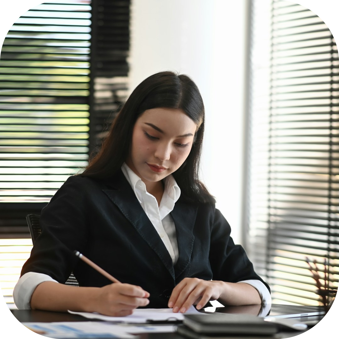 lawyer writing details in contract