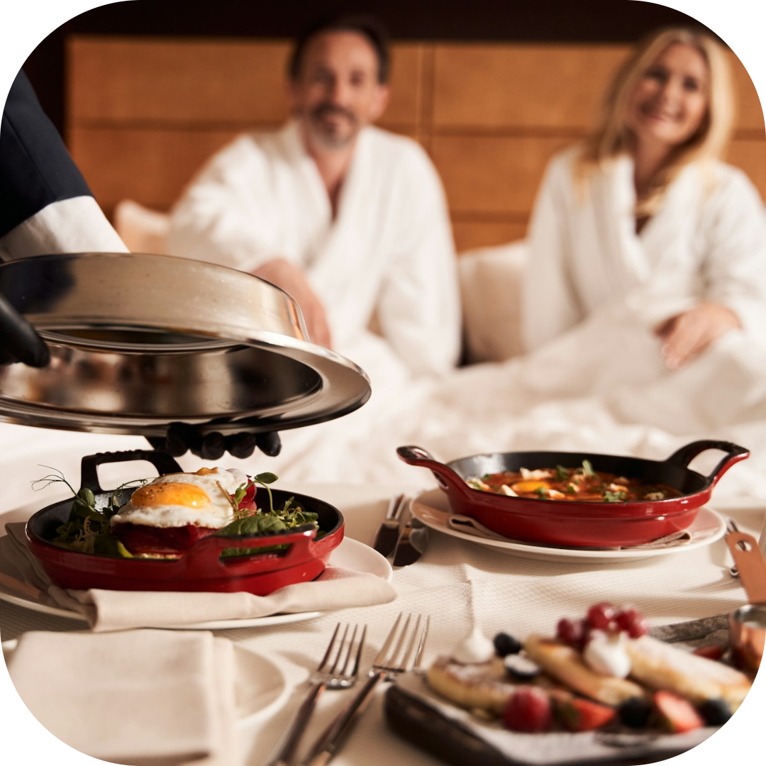 a couple recieving their room service