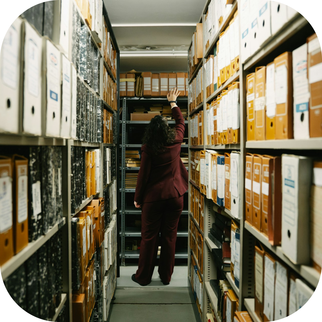 employee looking at company records